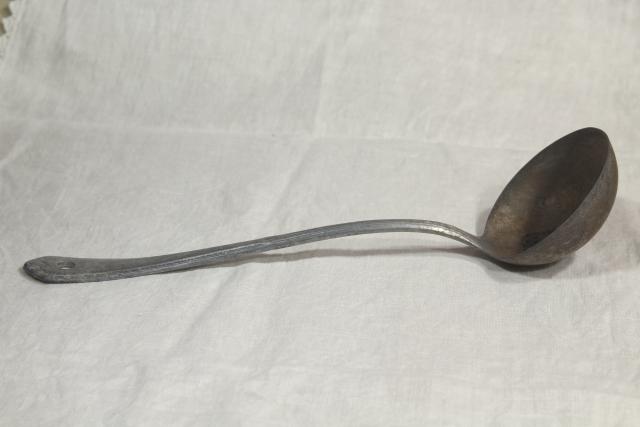 photo of 1920s vintage cast aluminum dipper or soup ladle, marked Germany #9