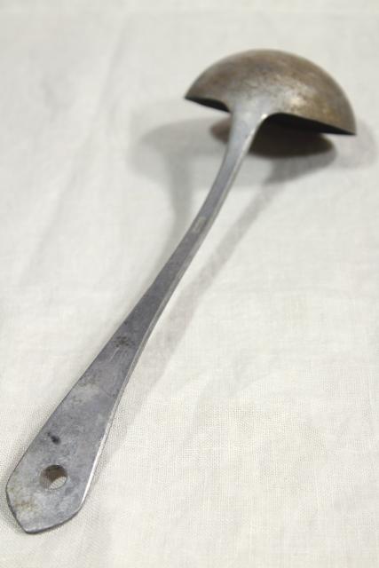 photo of 1920s vintage cast aluminum dipper or soup ladle, marked Germany #10