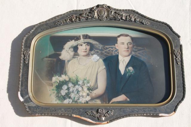 photo of 1920s vintage wedding photo portrait of Gatsby fashionable couple in convex bubble glass frame #6