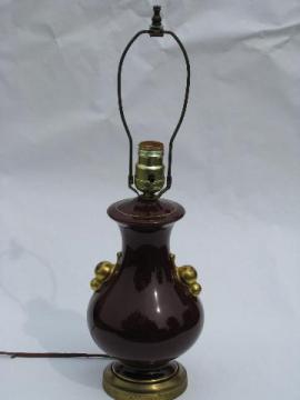 catalog photo of 1930's art deco vintage pottery table lamp, wine-maroon color
