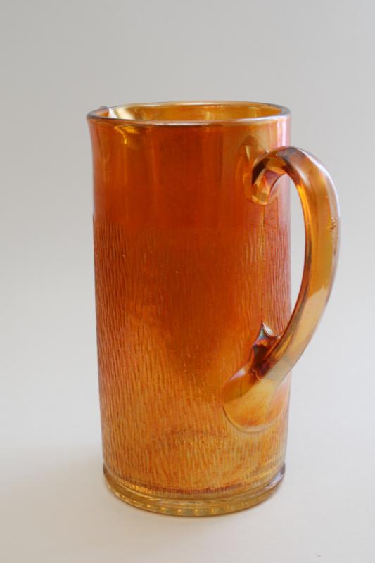 photo of 1930s vintage Jeannette carnival glass marigold orange luster, tree bark pitcher #5