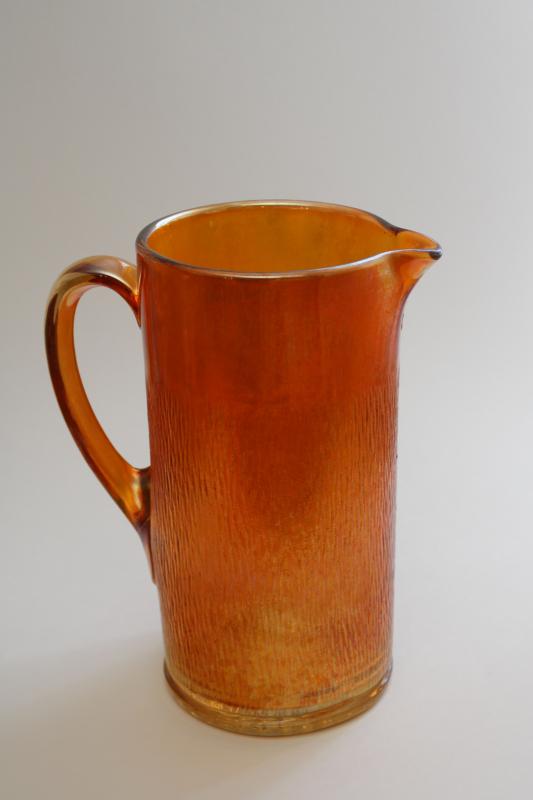 photo of 1930s vintage Jeannette carnival glass marigold orange luster, tree bark pitcher #7