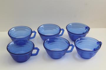 photo of 1930s vintage blue depression glass cups, large teacups Hazel Atlas Moderntone