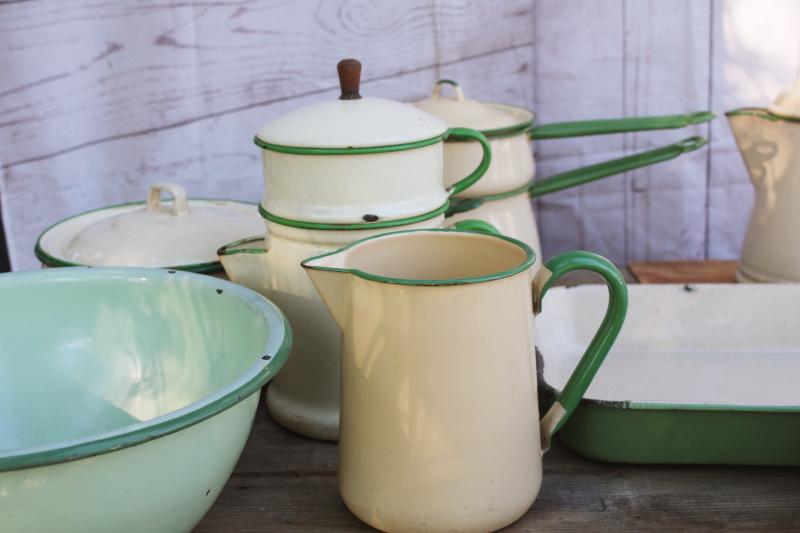 photo of 1930s vintage cream & green enamelware pots & pans collection, very worn old kitchenware for display #12