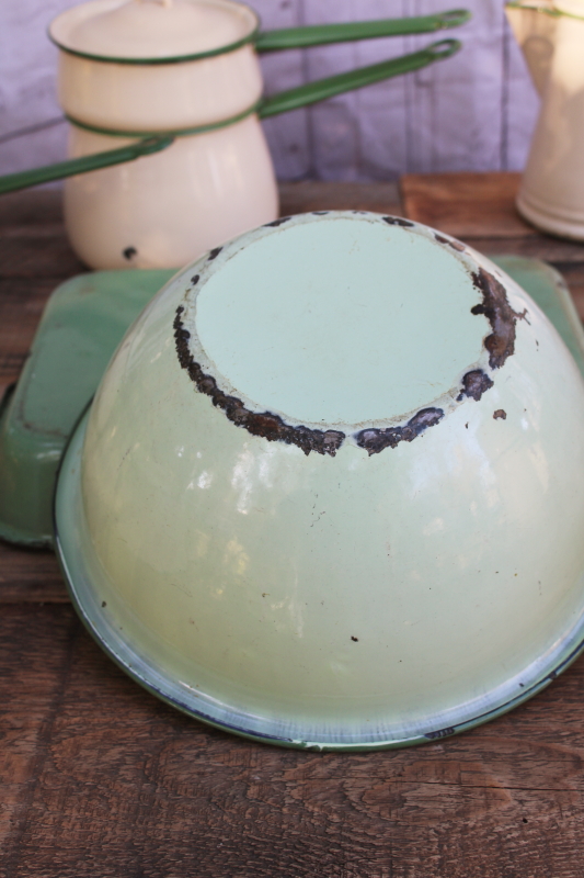 photo of 1930s vintage cream & green enamelware pots & pans collection, very worn old kitchenware for display #25