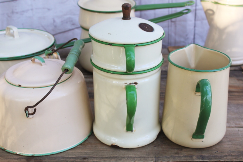 photo of 1930s vintage cream & green enamelware pots & pans collection, very worn old kitchenware for display #27