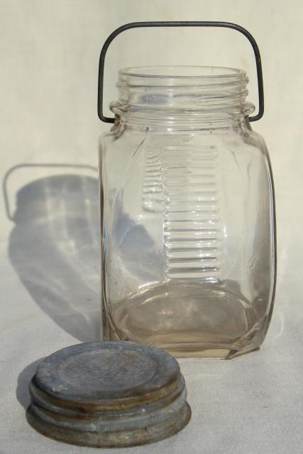 photo of 1930s vintage kitchen canister, old glass candy jar w/ wire bail handle, zinc lid #8