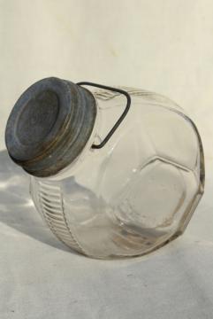 catalog photo of 1930s vintage kitchen canister, old glass candy jar w/ wire bail handle, zinc lid