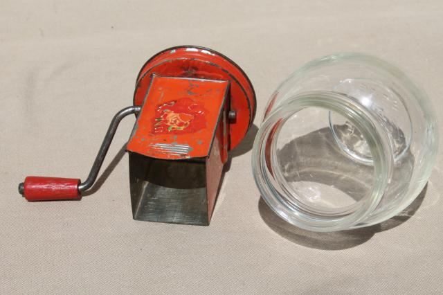 photo of 1930s vintage nut grinder, old red paint metal hand crank nut crusher w/ glass jar #6