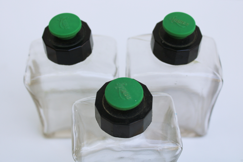 photo of 1930s vintage pharmacy bottles, Squibb green and black bakelite lids art deco glass bottle lot  #2