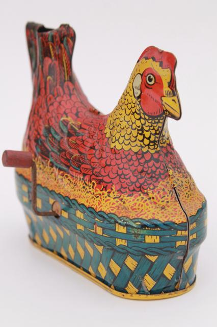 photo of 1930s vintage tin toy laying hen, metal litho print chicken on nest w/ egg #1