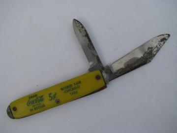 catalog photo of 1930s vintage yellow bakelite Coca-Cola advertising pocket knife, World's Fair