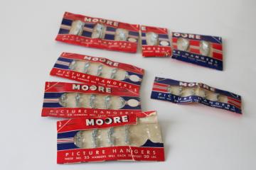 catalog photo of 1940s vintage picture hangers in original packages red white blue WWII Victory era 