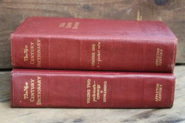 catalog photo of 1940s vintage two volume dictionary, big books w/ old red & gold covers