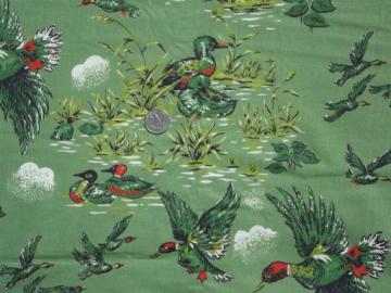 catalog photo of 1950s vintage cotton fabric, camp print wild ducks on hunter green