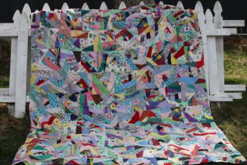 catalog photo of 1950s vintage crazy quilt, patchwork cotton prints bright colors tied quilt