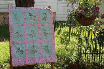 1950s vintage crib quilt, hand stitched embroidery baby animals pink & green blocks