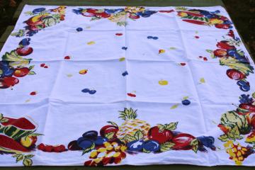 catalog photo of 1950s vintage fruit print tablecloth, small kitchen table size bright retro colors on white 