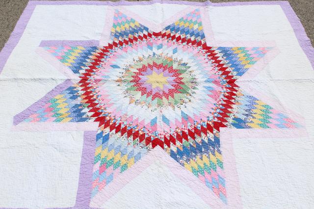 photo of 1950s vintage lone star patchwork quilt, cotton print fabrics hand pieced machine quilted #1