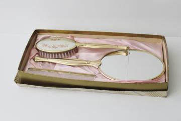 catalog photo of 1960s vintage vanity set, gold metal brush, comb, mirror in satin lined box