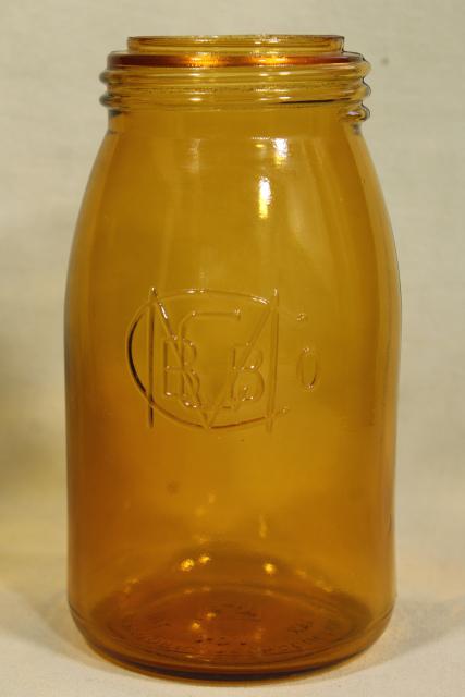 photo of 1970s vintage reproduction amber glass bottle, Buffalo Ball jar embossed mark canning jar #1