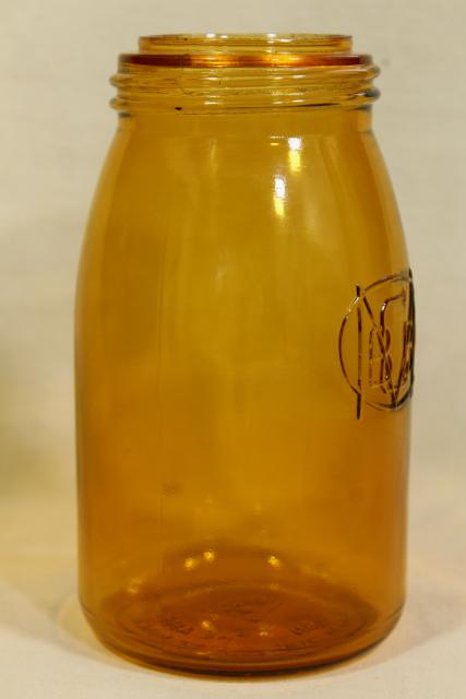 photo of 1970s vintage reproduction amber glass bottle, Buffalo Ball jar embossed mark canning jar #2