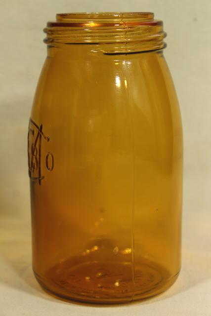 photo of 1970s vintage reproduction amber glass bottle, Buffalo Ball jar embossed mark canning jar #3