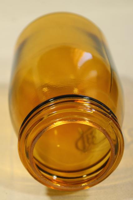 photo of 1970s vintage reproduction amber glass bottle, Buffalo Ball jar embossed mark canning jar #6