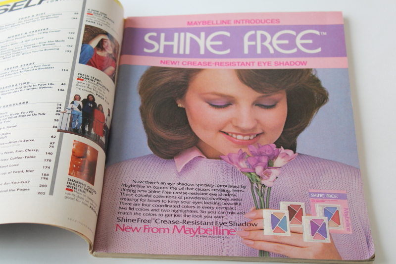 photo of 1980s vintage SELF magazine November 1984 back issue, tons of retro ads for makeup, beauty care #3