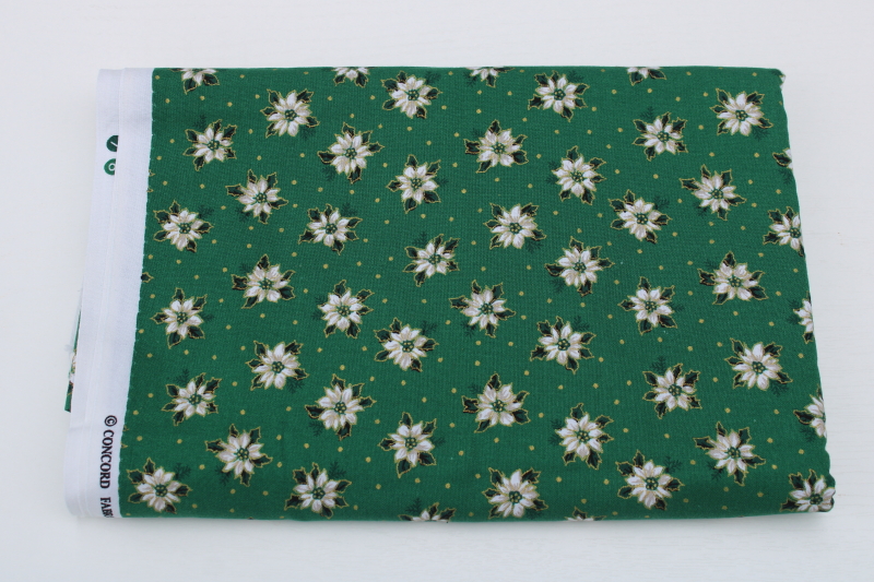 photo of 1990s vintage Christmas fabric, white poinsettias on green Kesslers print Concord fabrics cotton #1