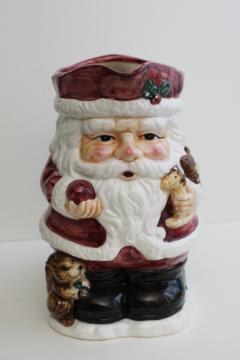 catalog photo of 1990s vintage hand painted ceramic Santa pitcher, St Nick w/ squirrel & toys 