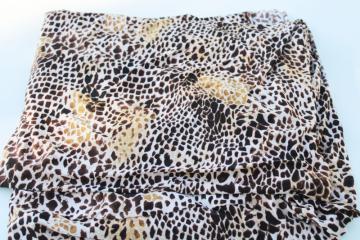 catalog photo of 1990s vintage wild animal print lycra spandex stretch fabric, black & tan leopard spots