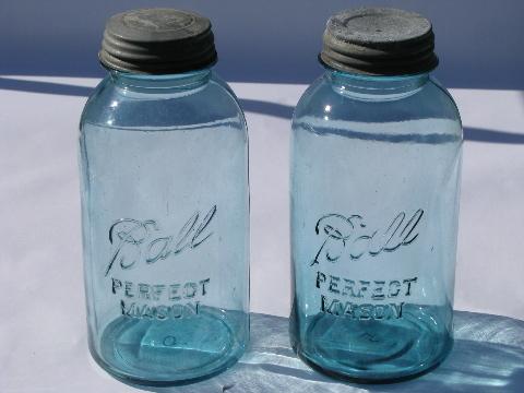 photo of 2 old Ball blue glass mason fruit jars/canisters w/ metal lids #1