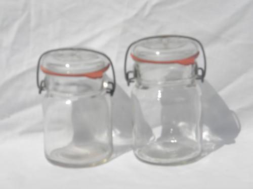 photo of 2 vintage glass fruit jars with lightning lids for storage canisters #1