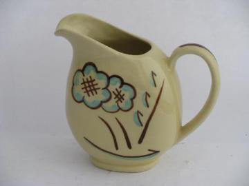 catalog photo of 40s - 50s vintage hand-painted pottery milk pitcher, blue & brown flower on yellow