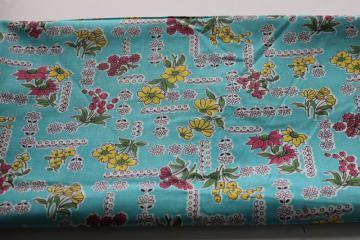 catalog photo of 50s vintage cotton fabric, flowered print in bold colors, red yellow turquoise