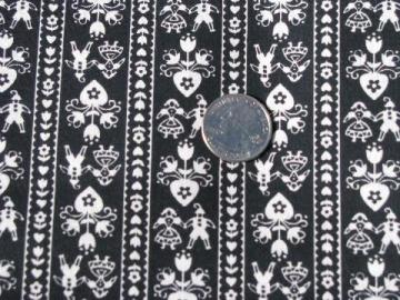 catalog photo of 50s vintage folk art cotton fabric, hearts & tiny people print, white on black