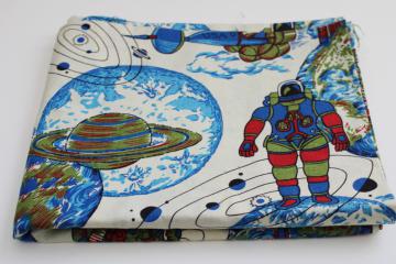 catalog photo of 60s 70s vintage cotton fabric, spacesuit astronauts moon landing rockets print