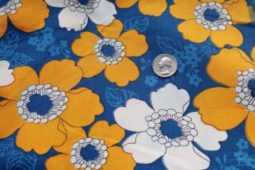 catalog photo of 60s 70s vintage fabric, large groovy flowers print orangey yellow gold on blue