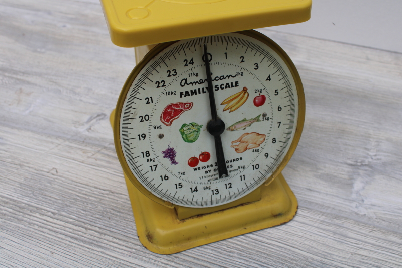 photo of 60s 70s vintage kitchen scale, works, original graphics yellow paint metal #6