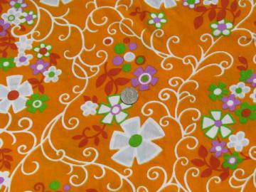 catalog photo of 60s mod flower power print on tangerine orange, retro vintage fabric