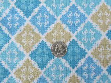 catalog photo of 60s vintage fabric, moorish tile print in shades of blue and tan