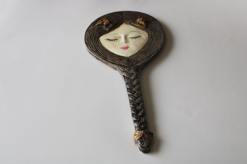 photo of 60s vintage hand mirror, flirty young girl face w/ long braid hair #1