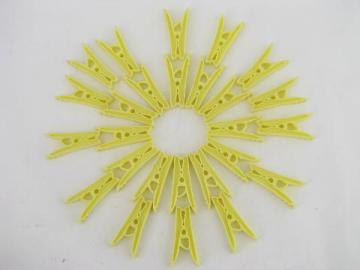 catalog photo of 60s vintage yellow plastic spring clip clothespins, never used