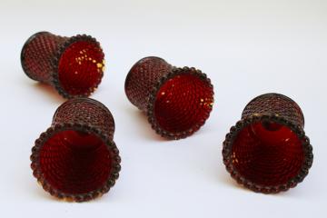 catalog photo of 70s 80s vintage Taiwan hobnail glass votive candle holders, amber w/ worn ruby stained color 