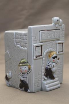 catalog photo of 70s 80s vintage ceramic savings bank, coin slot bank w/ very retro bank robbers!