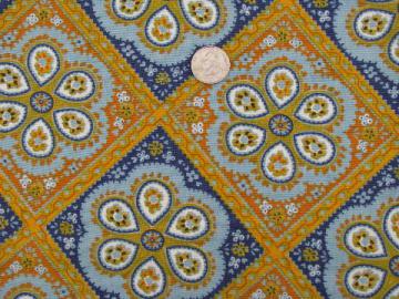 catalog photo of 70's moorish tile print blue / gold cotton fabric