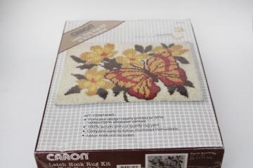 catalog photo of 70s vintage Caron sealed latch hook rug kit, yarn & print canvas butterfly & flowers 