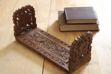 catalog photo of 70s vintage carved wood book rack, expandable bookshelf stand, boho style India sheesham or teak wood