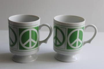 catalog photo of 70s vintage ceramic mugs Peace sign emblems in green, Pride Creations NYC 